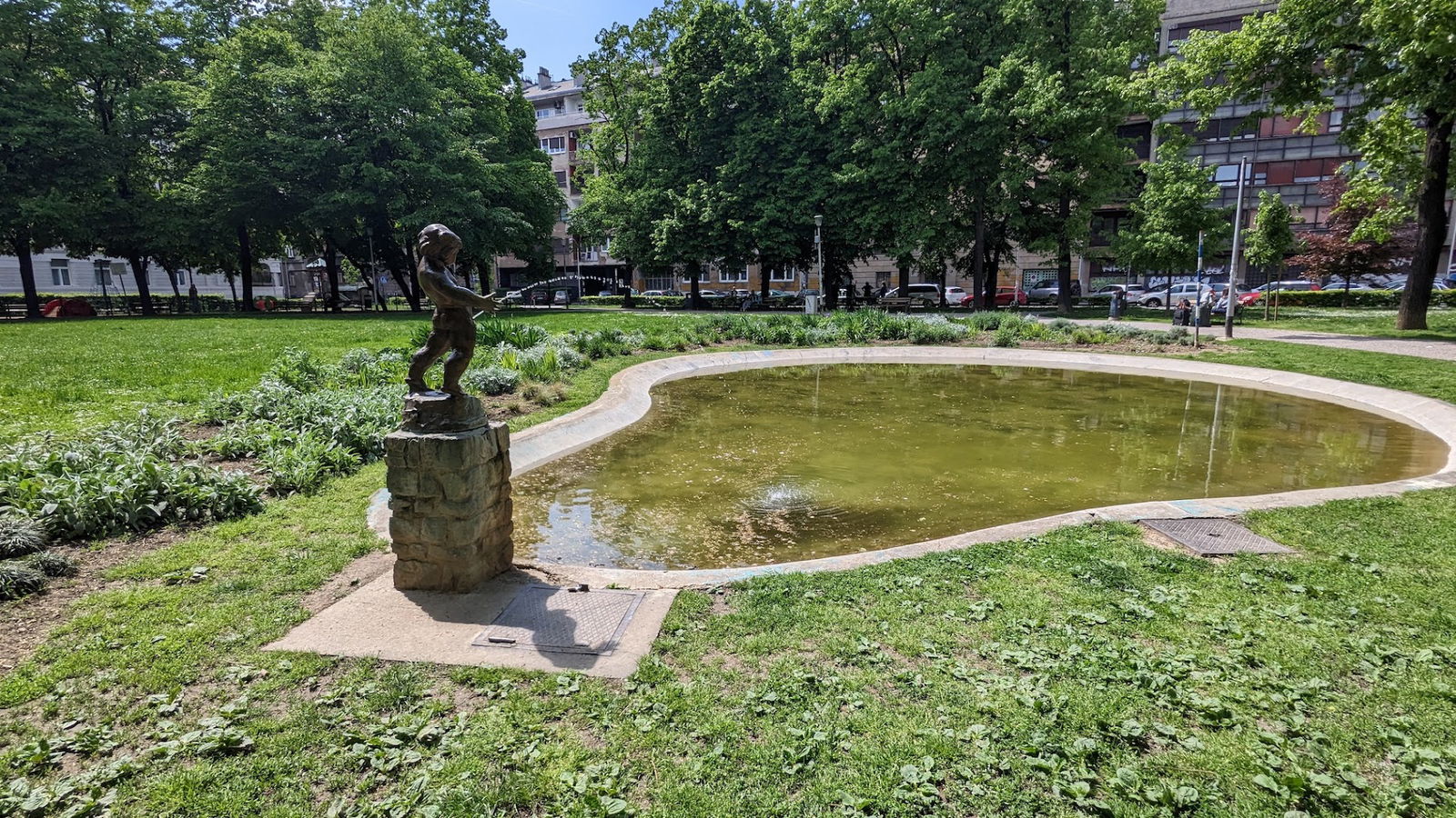 Standing nude boy sculpture