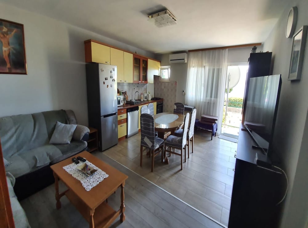 Spacious Apartment Steps From the Beach, With Private Terrace and Grill