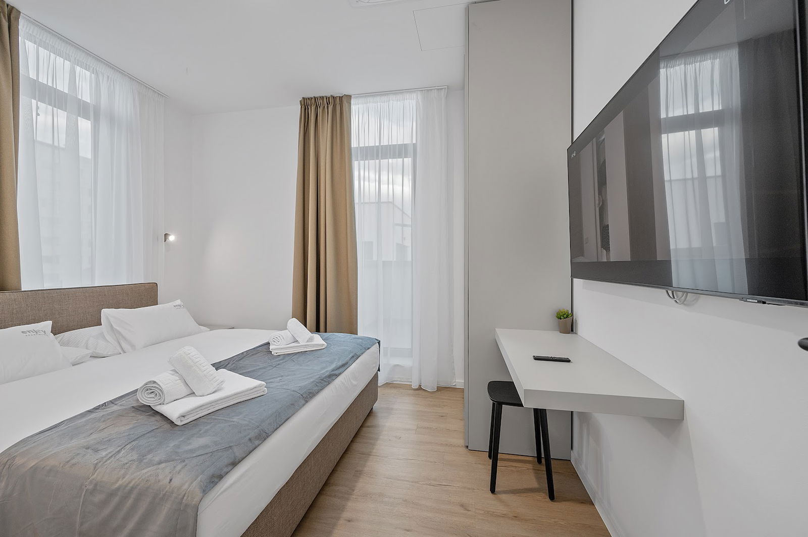 ENJOY APARTMENTS & SUITES